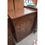 A late 19th century French mahogany wash stand, the hinged top revealing a marble lined interior,