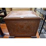 An unusual early 20th century Egyptian Revival oak and embossed copper box or casket, decorated on