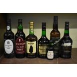 Six various bottles of port and sherry, and a 10cl miniature bottle. (7)