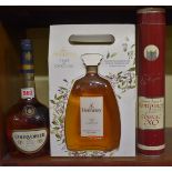 Three bottles of Cognac, comprising: a 70cl Hennessy Fine de Cognac, in card bag; a 70cl Courvoisier