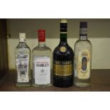 Four bottles of spirits, to include: a 1 litre bottle of Three Barrels VSOP brandy. (4)