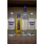 Four bottles of vodka, comprising: two 1 litre Absolut; a 70cl Poliakov; and a 50cl Khortytsa '