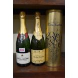 Two bottles of NV Champagne, comprising a 75cl Bollinger; and a Nicolas Feuillatte, in metal tin.