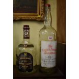 Two large empty whisky bottles; comprising: an old 1 gallon The Royal and Ancient Scotch Whisky; and