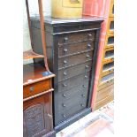 A late 19th/early 20th century oak Wellington chest, with eight mahogany lined drawers, 63cm wide.