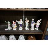 Three pairs of continental porcelain figures, to include two Sitzendorf pairs, largest 18cm high.