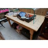 An old pine kitchen table, with lateral frieze drawer, 169cm long.