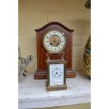 An Edwardian mahogany mantle clock, 30cm high; together with a brass carriage timepiece.