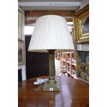 An old brass Corinthian column table lamp, height excluding fitting 44cm.