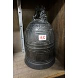 A Chinese bronze temple bell, probably Ming, 27cm high.