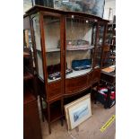 An Edwardian mahogany and inlaid bowfront display cabinet, 122cm wide.