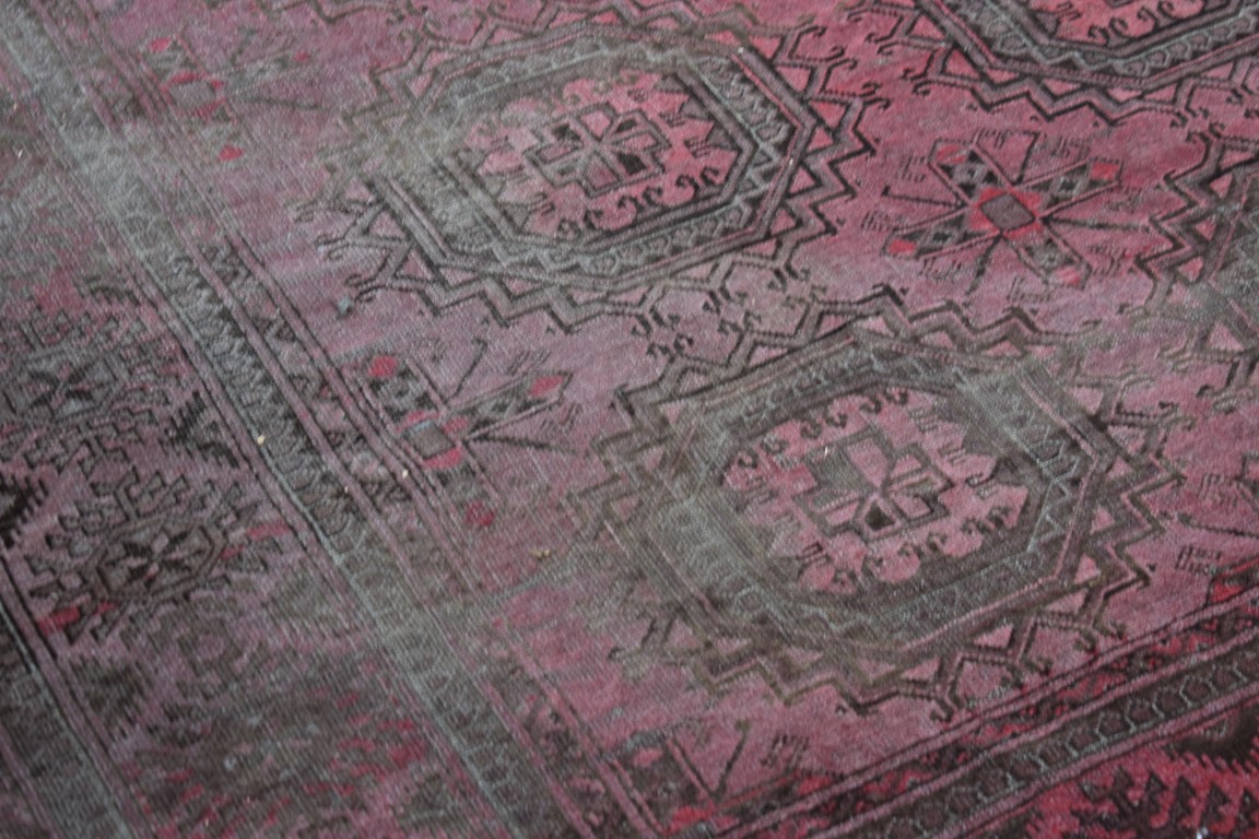 A Persian rug, having repeated design to central field, with geometric borders, 248 x 195cm. - Image 2 of 3