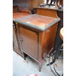A circa 1900 mahogany and inlaid bedside cupboard, 41cm wide.