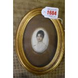 English School, early 19th century, head and shoulders portrait miniature of a young lady, with