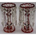 A pair of Bohemian ruby flashed glass lustres, 26.5cm high, (small chips).