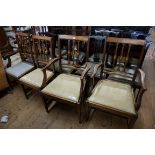 A set of five late 19th century mahogany and satinwood dining chairs, to include a pair of elbow