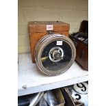 An oak cased racing pigeon clock.