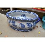 A reproduction blue and white foot bath, 56cm wide; together with a collection of Wedgwood '