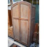 A Heal & Son limed oak bedroom suite, comprising: a double wardrobe, 88.5cm wide; a chest of