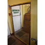 A large gilt framed rectangular wall mirror, 162.5 x 100.5cm.