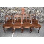 A set of seven oak dining chairs, and another similar. (8)This lot can only be collected on Saturday
