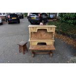 A pine dresser base, 112cm wide; together with an oak stool; and an Arts & Crafts style elm topped