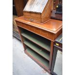 An Edwardian mahogany and inlaid open bookcase, 84.5cm wide.