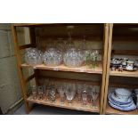 A collection of 19th century and later glassware. (two shelves)