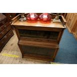 A Lebus oak two tier sectional bookcase, 88cm wide.