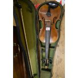 An antique Continental violin, labelled 'Joseph Guarnerius,...1660', with 14in two piece back,
