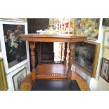 An Edwardian walnut octagonal centre table, 84cm wide.