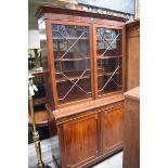 An early 20th century mahogany bookcase, 128cm wide.