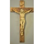 A good 18th/19th century carved ivory Corpus Christi, possibly Dieppe, on gilt walnut cross, the