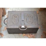 A Victorian cast iron revenue strongbox, 45cm wide, (s.d. to hinge), with key.