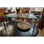 A steel and bevelled glass rectangular low occasional table, 100 x 60cm.