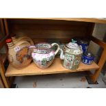 A mixed lot of pottery and porcelain, to include: a Chinese famille rose wine pot and associated