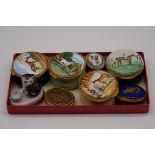A collection of Crummles and Kingsley enamel boxes; together with other similar. (8)