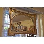 A Victorian gilt framed overmantel type mirror, 64 x 95.5cm.