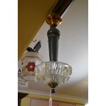 An Art Deco frosted glass and painted turned wood ceiling light, in the manner of Jean Gauthier