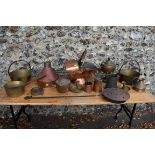 A quantity of copper and brassware, to include a copper and iron bed warmer. This lot can only be