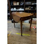 A George III mahogany and inlaid Pembroke table, 90.5cm when open.