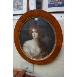 A pair of antique mahogany framed oval prints, the whole 60.5 x 54cm.