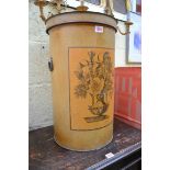 An unusual 19th century toleware cylindrical storage bin and cover, 54cm high.