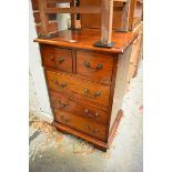 A small modern hardwood chest of drawers, 52cm wide.