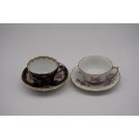 Two Meissen cups and saucers, each finely painted with floral sprays.