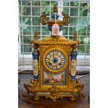 A Louis XVI gilt spelter and painted porcelain mantel clock, the bell striking movement inscribed 'R