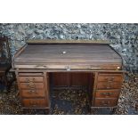 An antique mahogany roll top desk. This lot can only be collected on Saturday 10th October. (10-2pm)