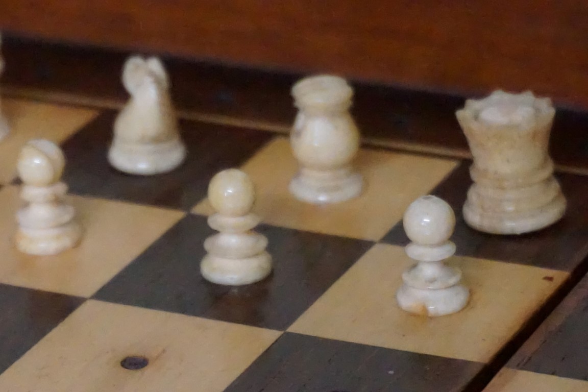 A Victorian mahogany folding chessboard, with bone chess set, the board 30.5cm wide. - Image 5 of 12