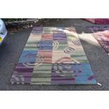 A modern 'Roundabout' rug, 236 x 157cm.