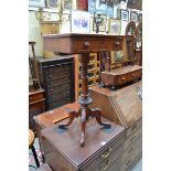 A Victorian walnut pedestal occasional table, 46.5cm wide.